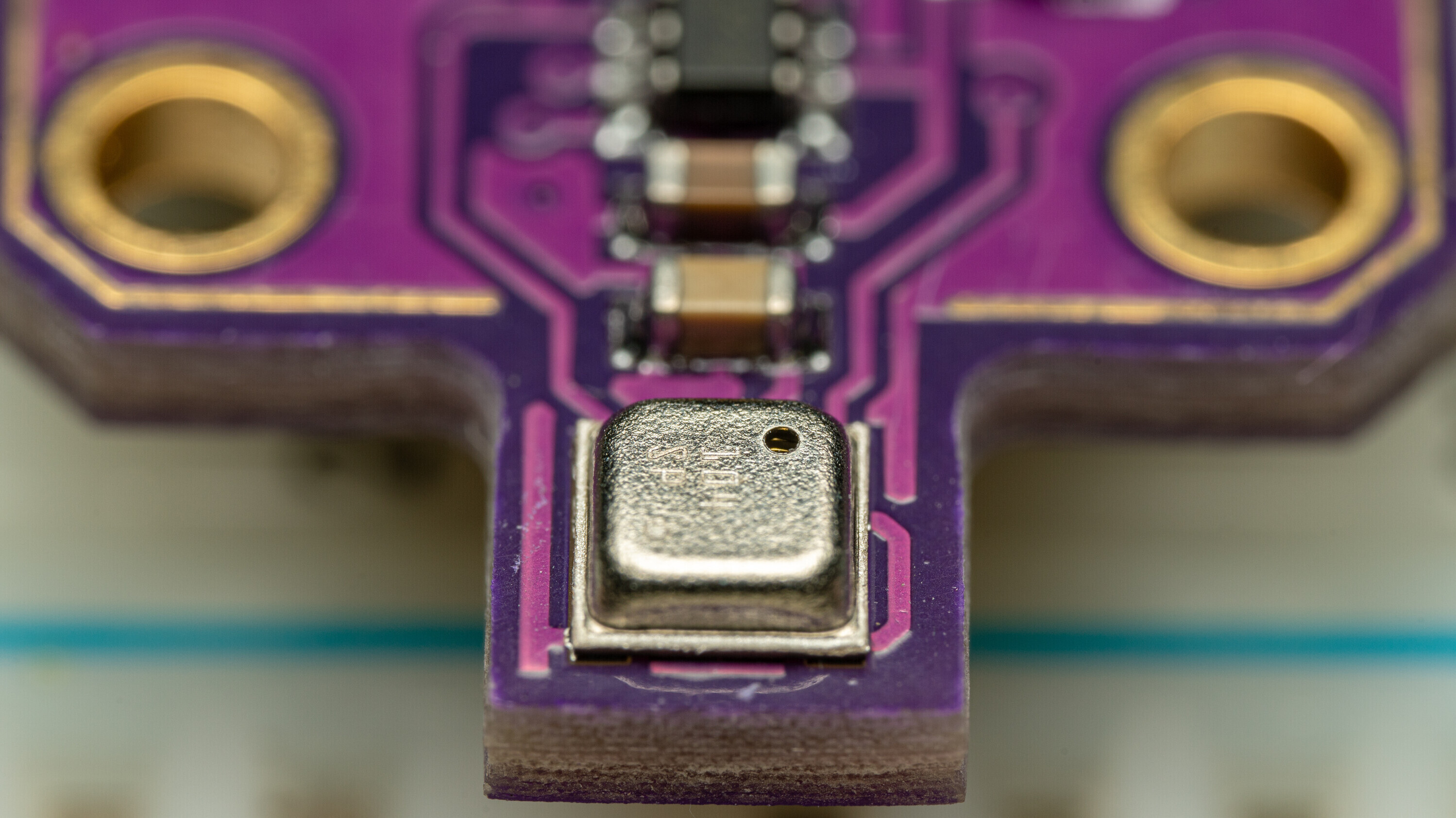 Macro Photo of a Purple PCB Module for the BME680 MEMS Environmental Sensor.